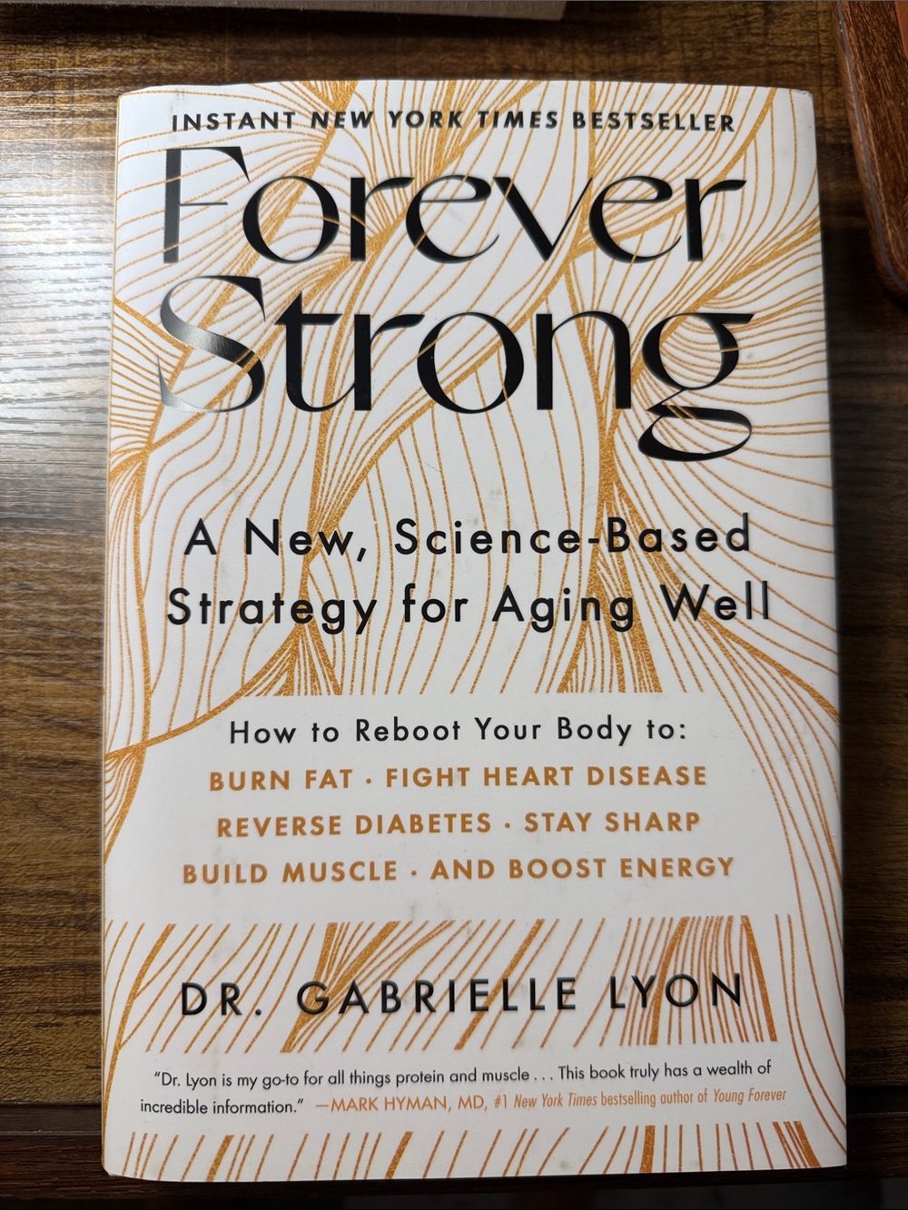 Forever Strong by Dr. Gabrielle Lyon — White & Gold Hardcover